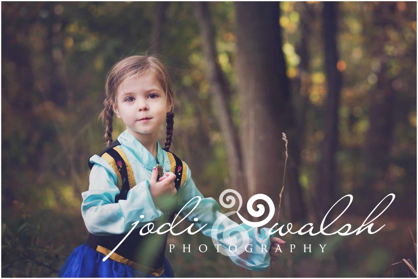 little girl dressed as Princess Anna from Frozen, fall Storybook portrait session