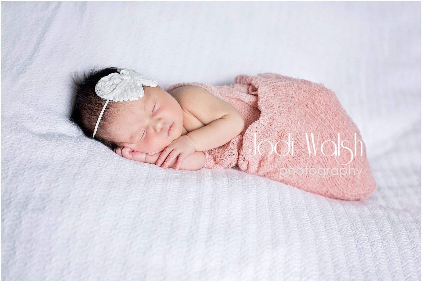 newborn girl, pink wrap, white headband