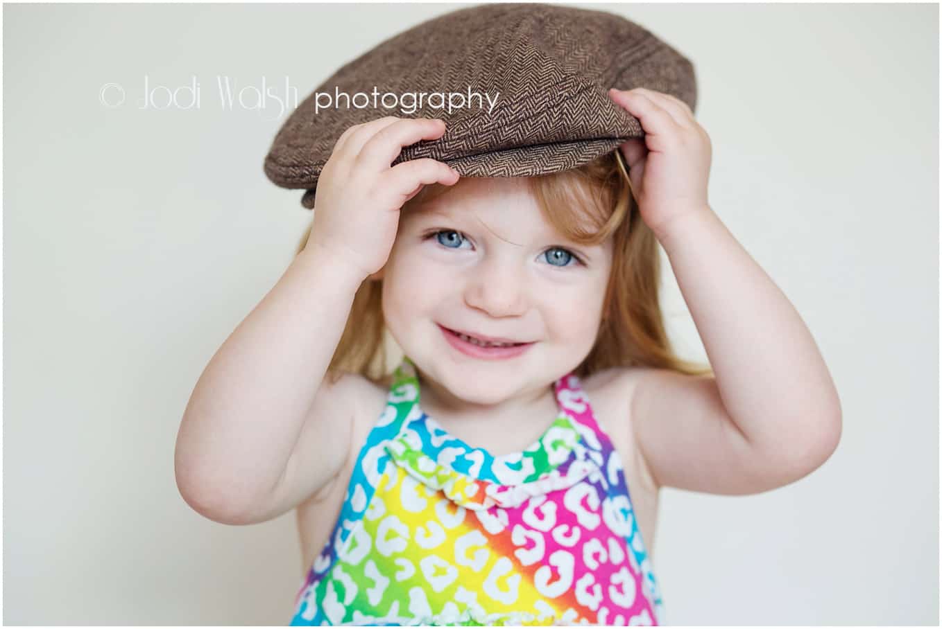 little girl, brown hat