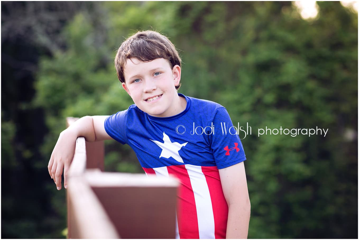 tween, boy in red, white and blue