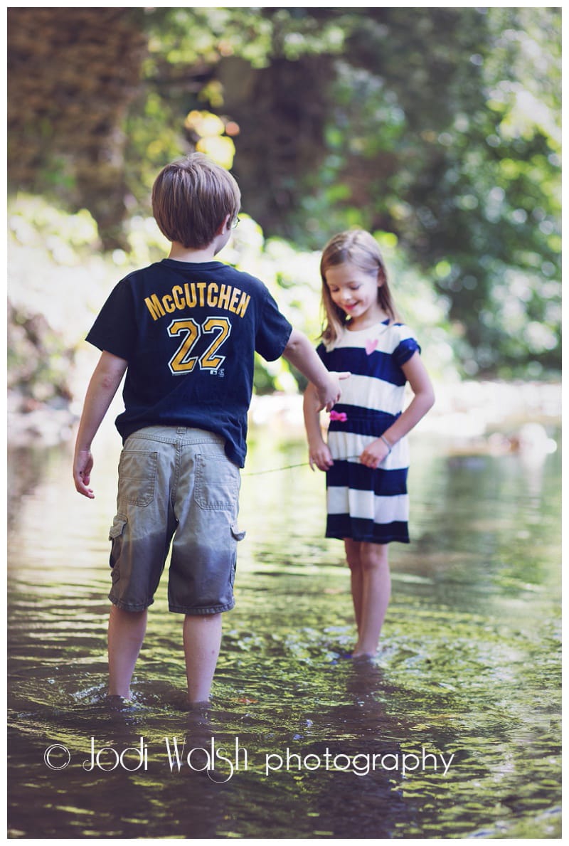 boy and girl playing in a western Pennsylvania creek