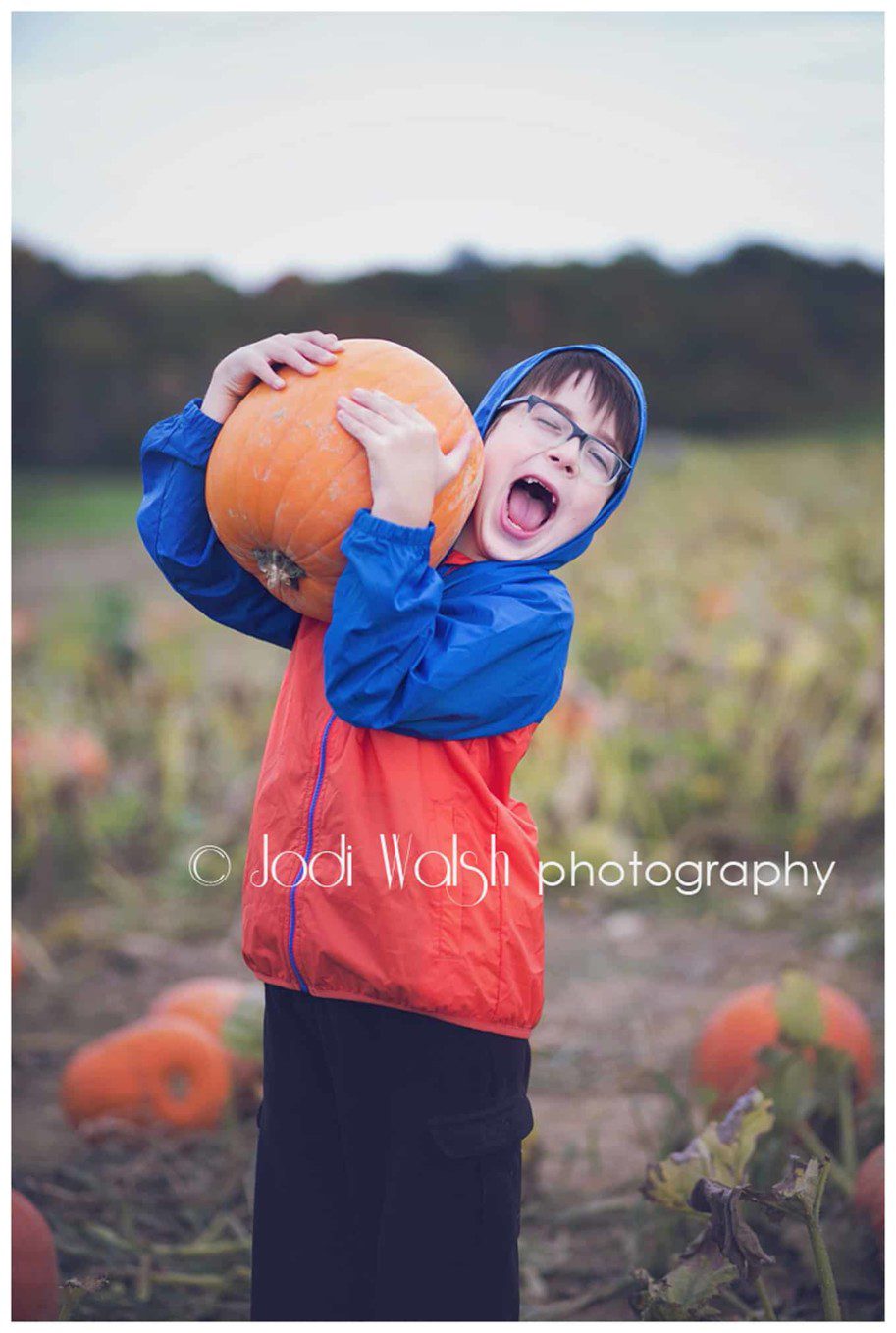boy carrying pumpkin, Western PA