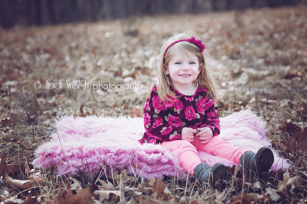 Franklin Park in winter, little girl, brown leaves and pink fur
