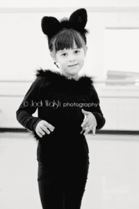 little girl in cat dance costume