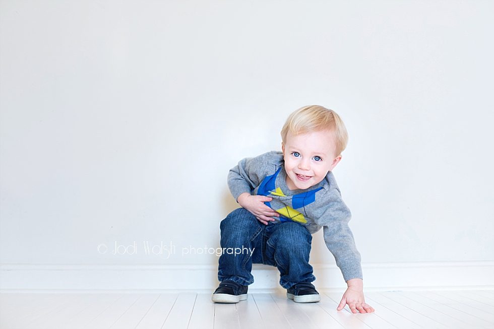 toddler boy in blue and gray sweater, in-home Pittsburgh studio portrait session