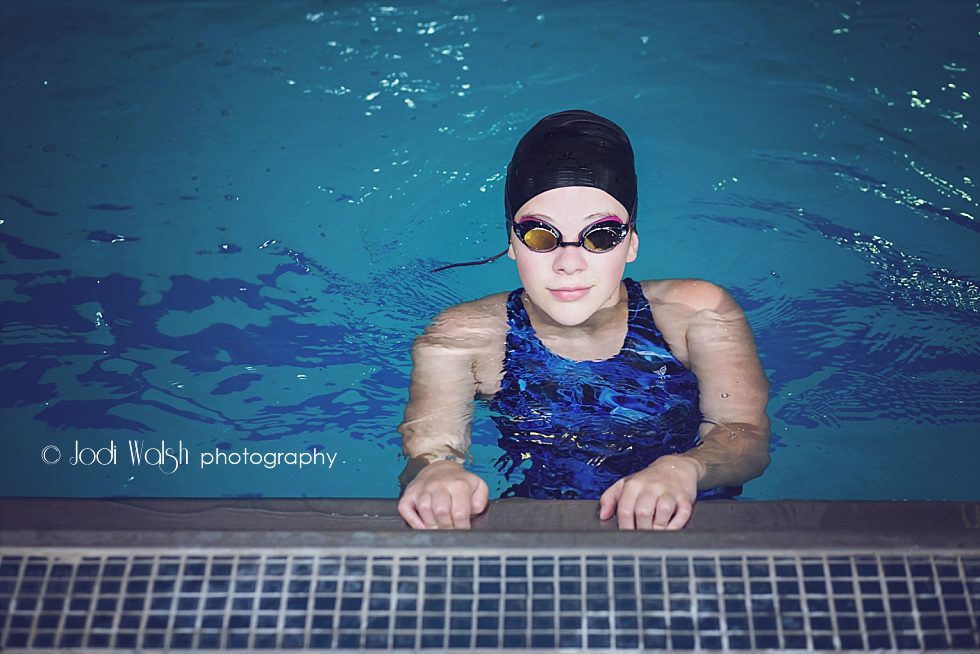 Pittsburgh tween swimmer in pool with goggles