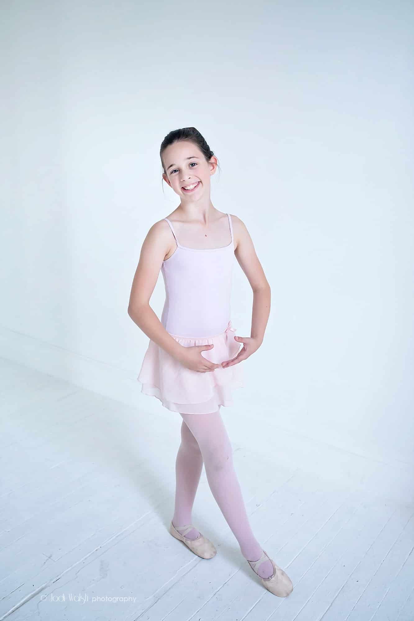 teen dancer in pink leotard
