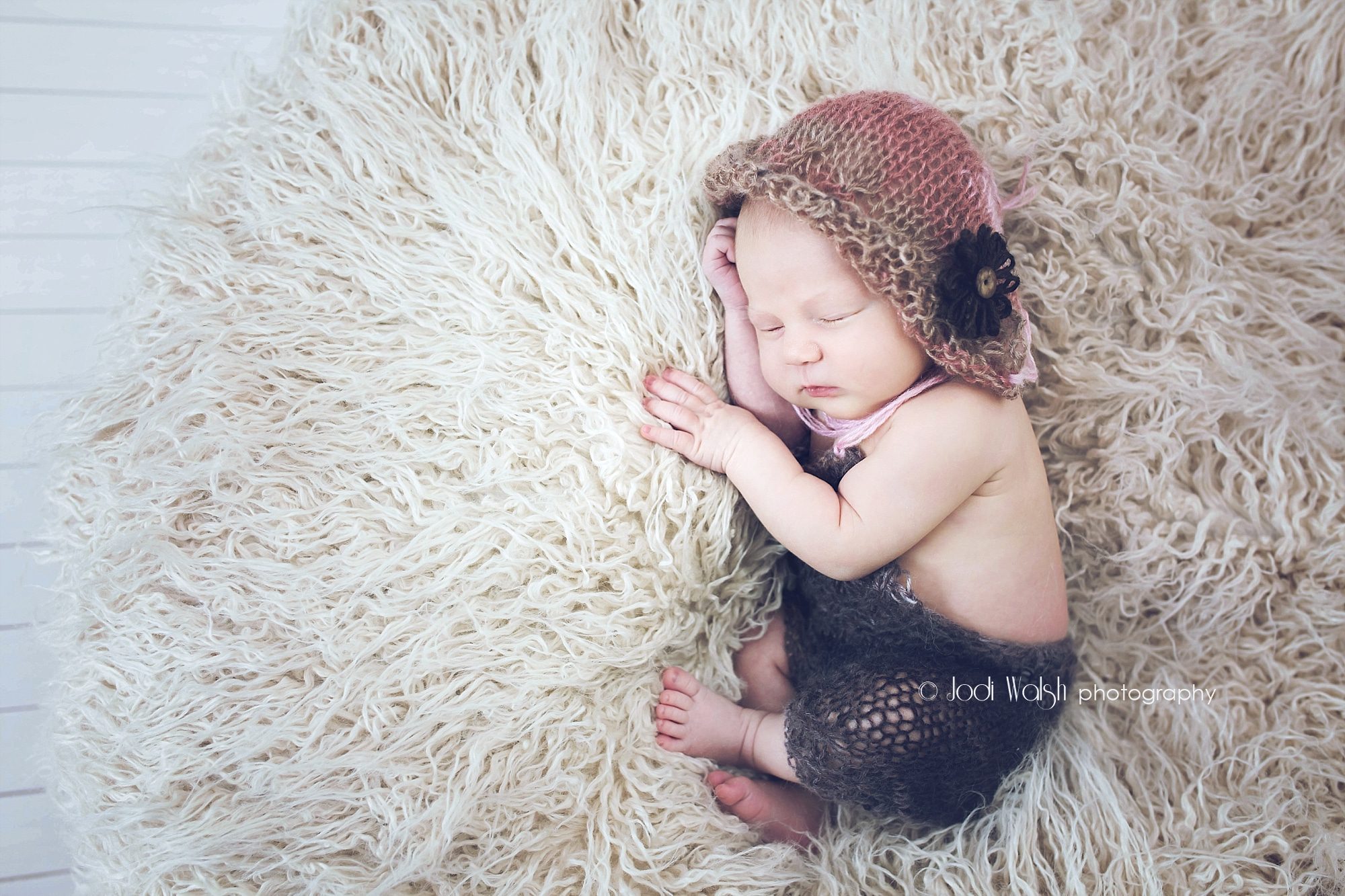 newborn, girl, knitted romper and bonnet