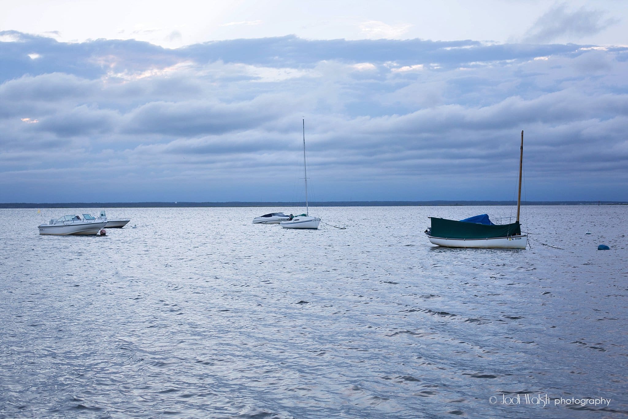 boats with cloudy skies on Barnegat Bay, New Jersey