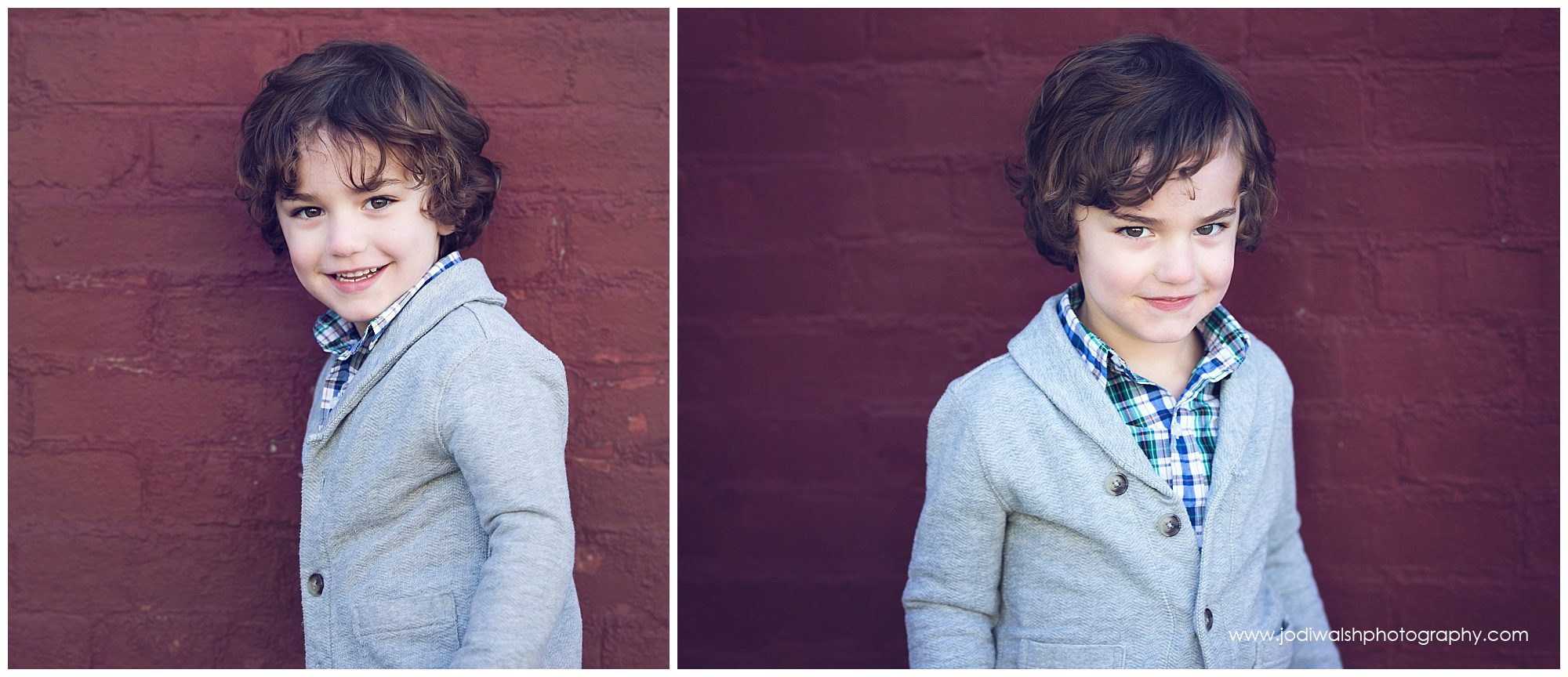 little boy with curls, red brick wall