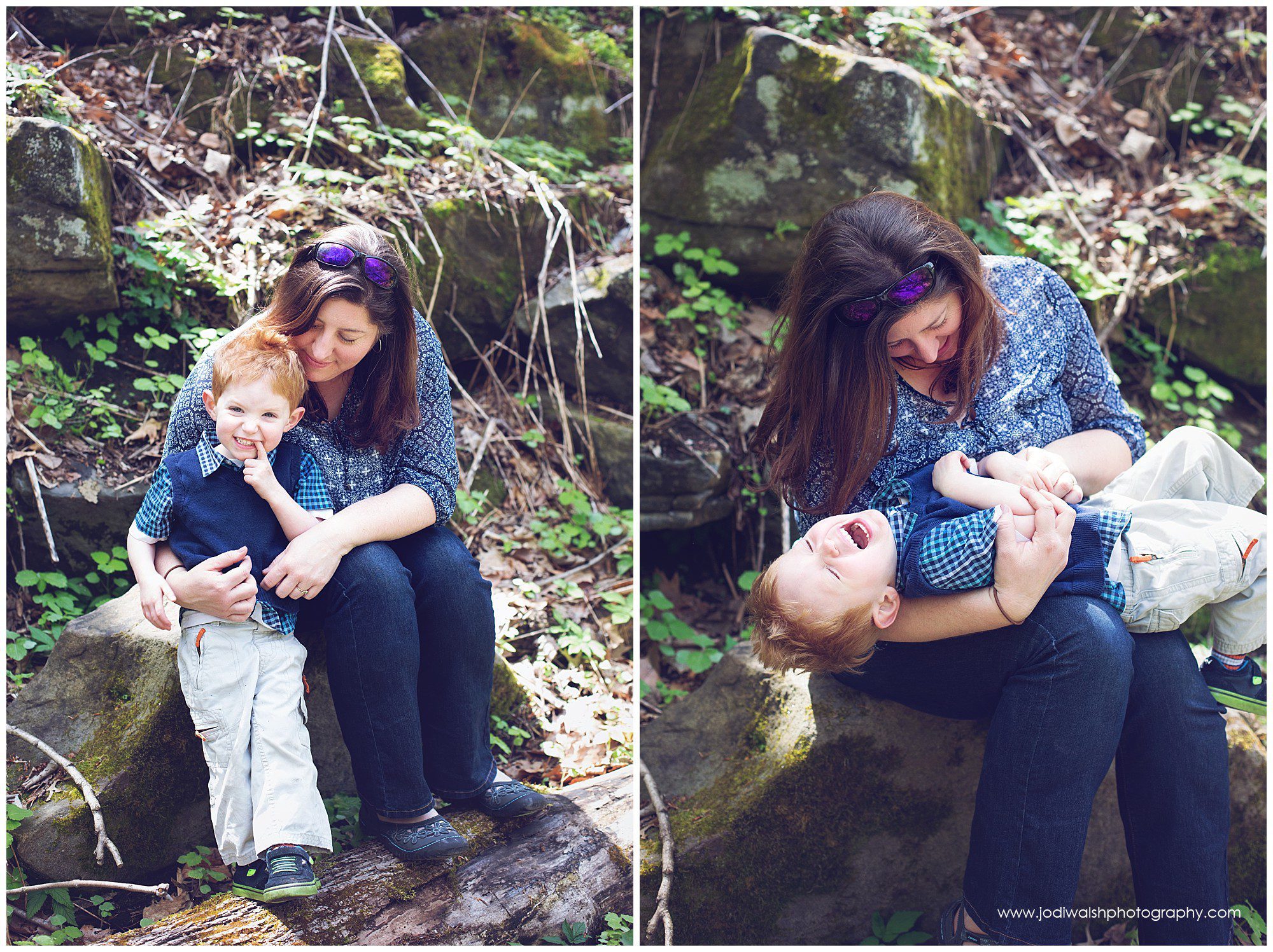 mother and red-haired son cuddling while sitting on rocks in Pittsburgh Schenley Park