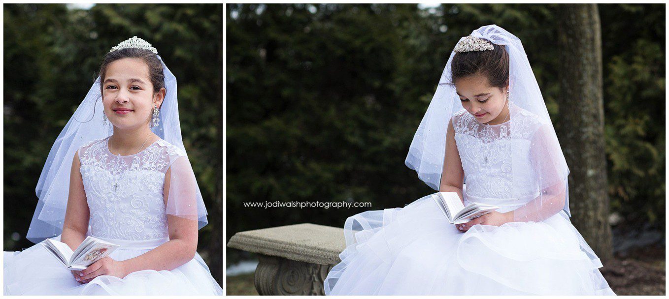 image of little girl in white first communion dress reading a prayer book in her lap while sitting outside of a church in  Wexford