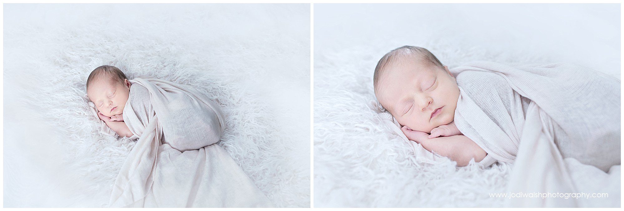 sleeping newborn baby girl in white wrap on white fur