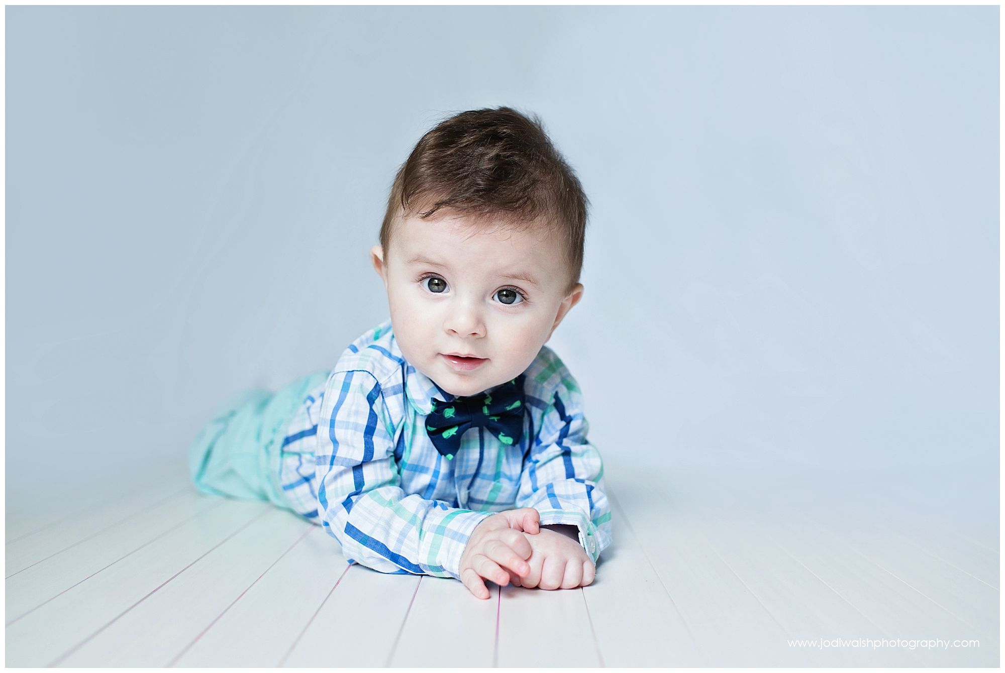 baby boy with navy blue bowtie