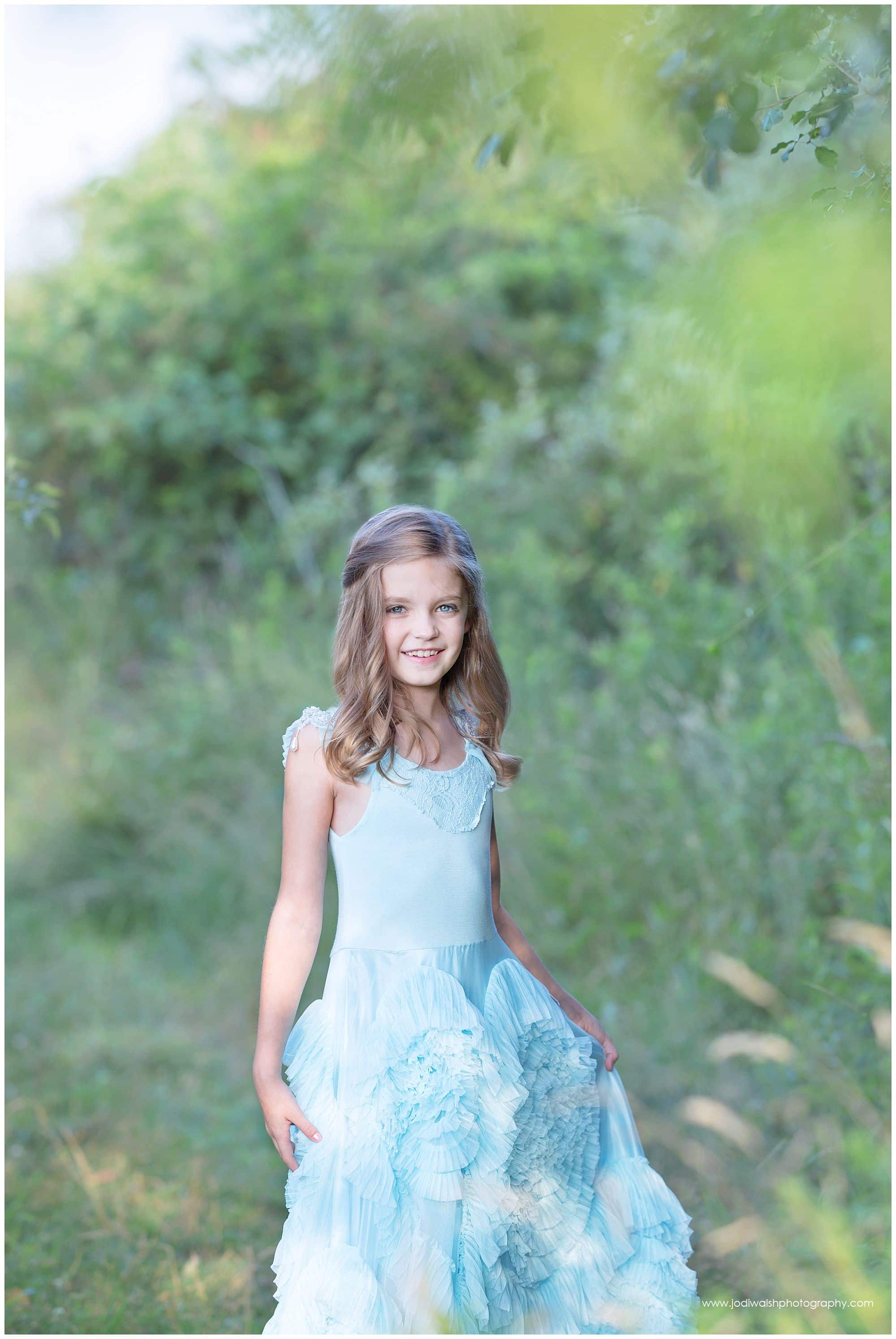 girl in blue princess dress from Dollcake in field near Pittsburgh