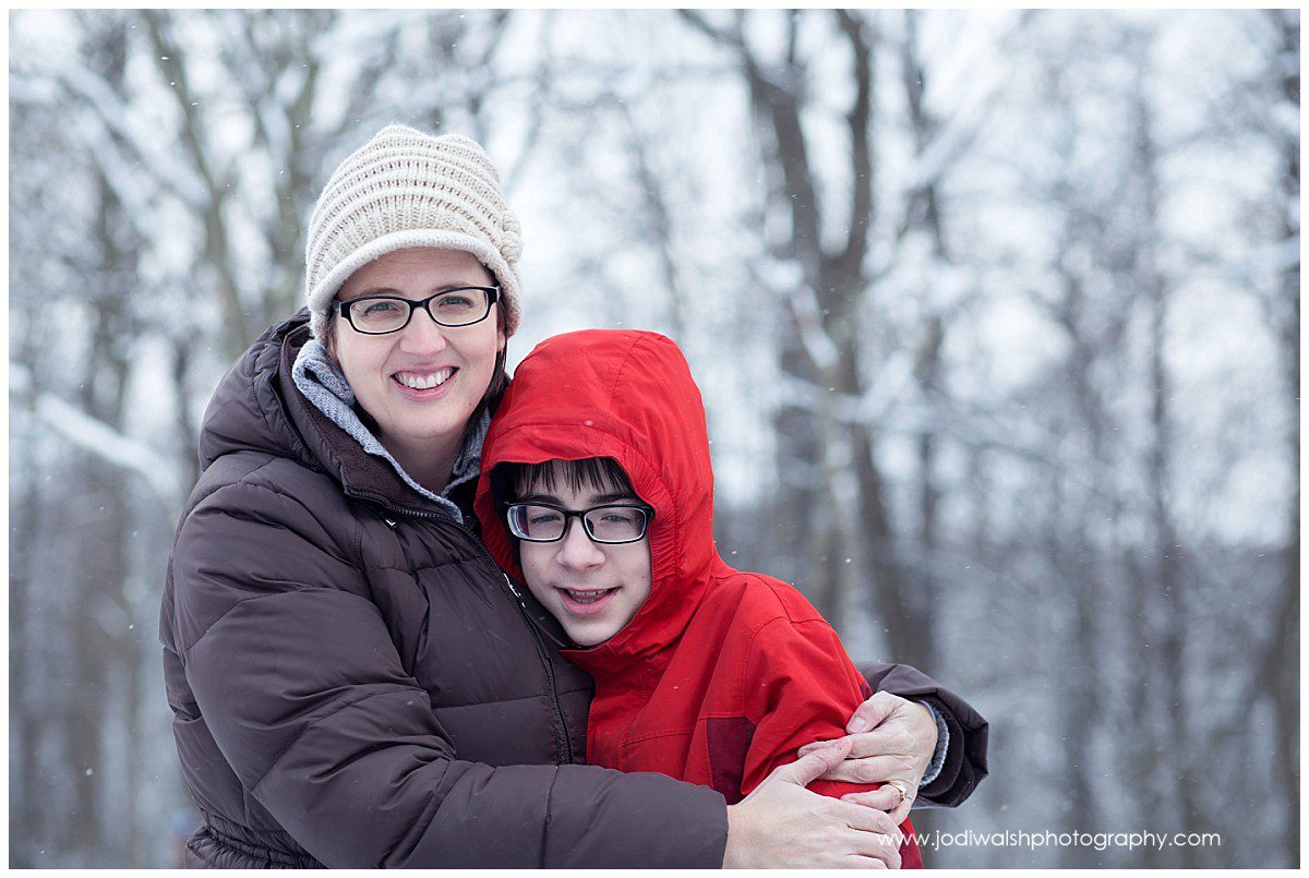 mother and son hugging in winter, Pittsburgh