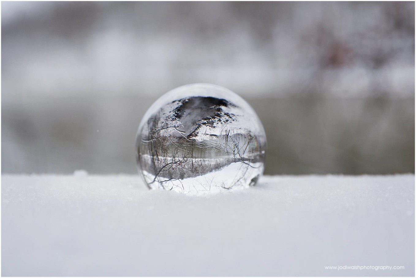 snow day photos with glass lensball showing North Park Lake
