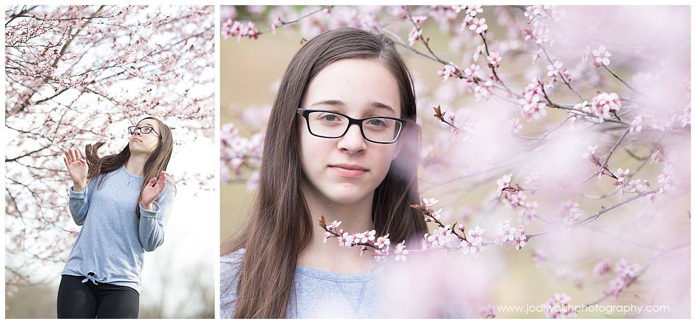 images of a teen girl standing near a tree with light pink blossoms. In the first image she's leaning back to avoid a bee. The second image is a closeup. She's wearing glasses and has a thoughtful expression