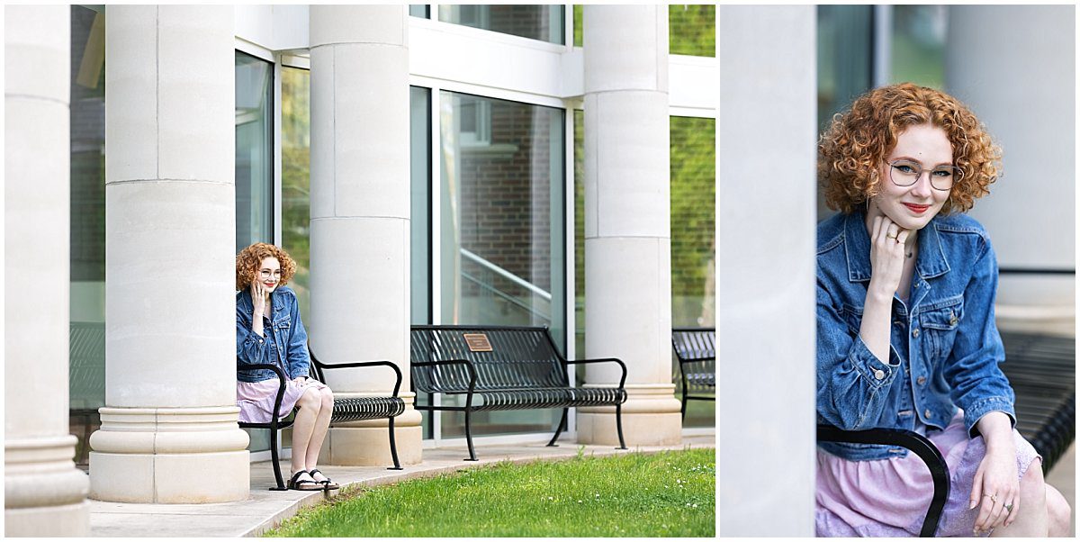 images of a senior girl with curly hair and glasses seated on a bench at Indiana University of Pennsylvania. She's wearing a denim jacket over a flowered dress.
