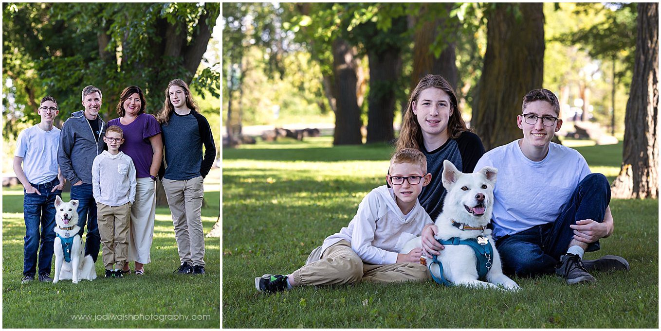 images of a family with older kids, two high school age boys and a one younger boy.  They're standing together in a grassy area with large shade trees.  Their white dog is sitting on the ground with them.