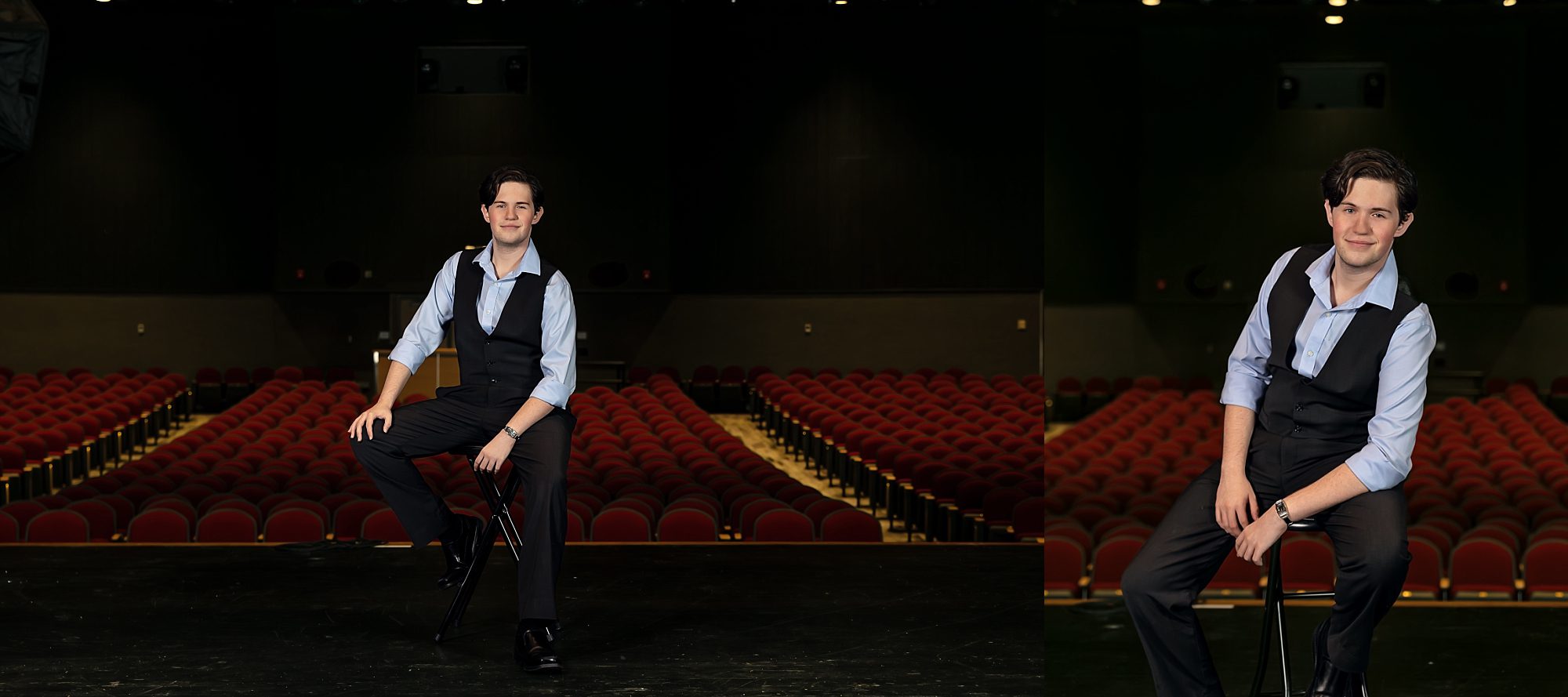 senior guy sitting on stage in an auditorium.  He's wearing dress pants and a vest.